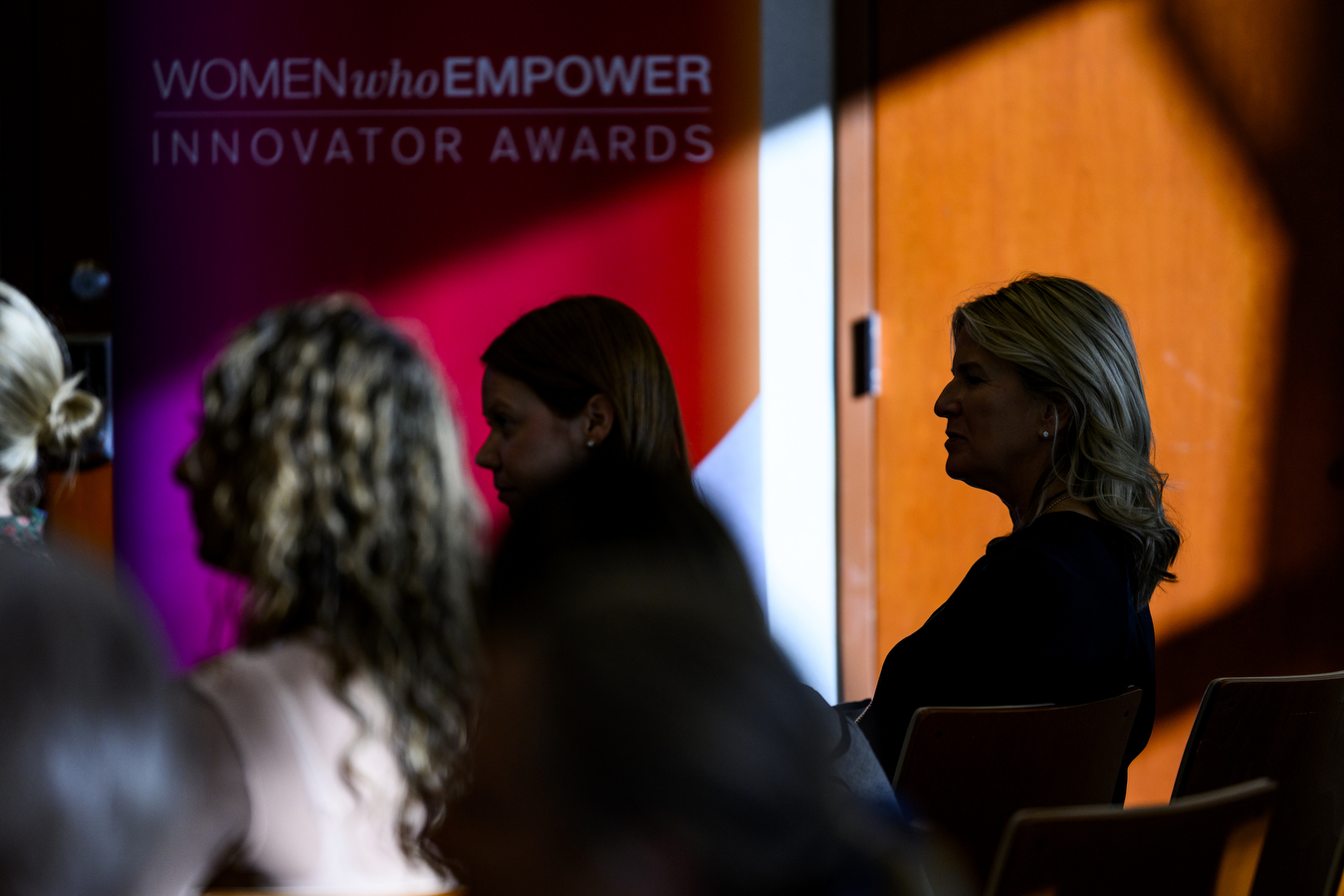 Silhouette of audience members at Women Who empower event