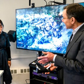professor Miso Kim receiving University Excellence in Teaching award