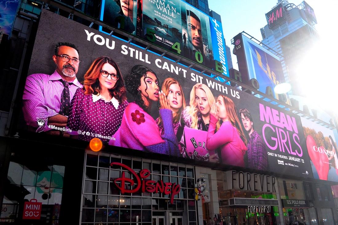 A billboard displaying an advertisement for the 