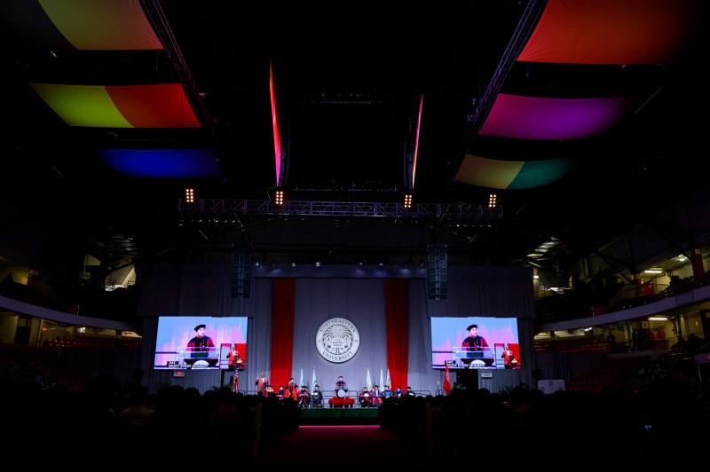 The Doctor of Philosophy Hooding in Matthews Arena.