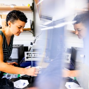Gabriela Garcia working in a lab.