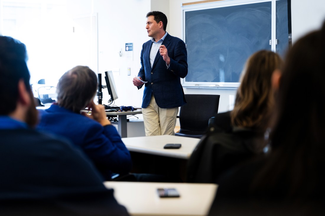 Northeastern professor speaks to attendees about Israeli Palestinian collaboration through business and startups.