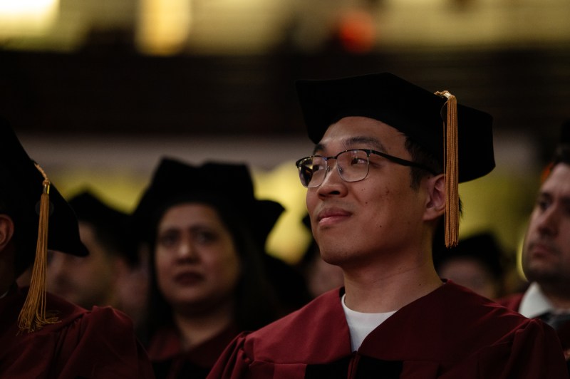A PhD grad listening from the audience.