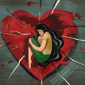 An illustration of a person with long hair sitting with their knees pulled into their chest in the middle of a large red heart with cracks all through it. The person and the heart are on a grey background.