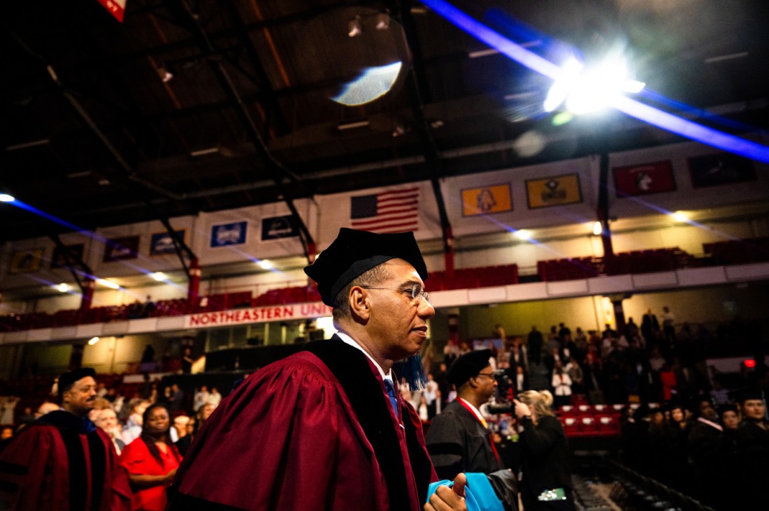 Andrew Michael Holness in Matthews Arena at commencement.