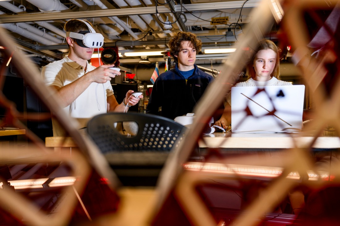 Students work in a lab on a project ahead of a NASA competition.