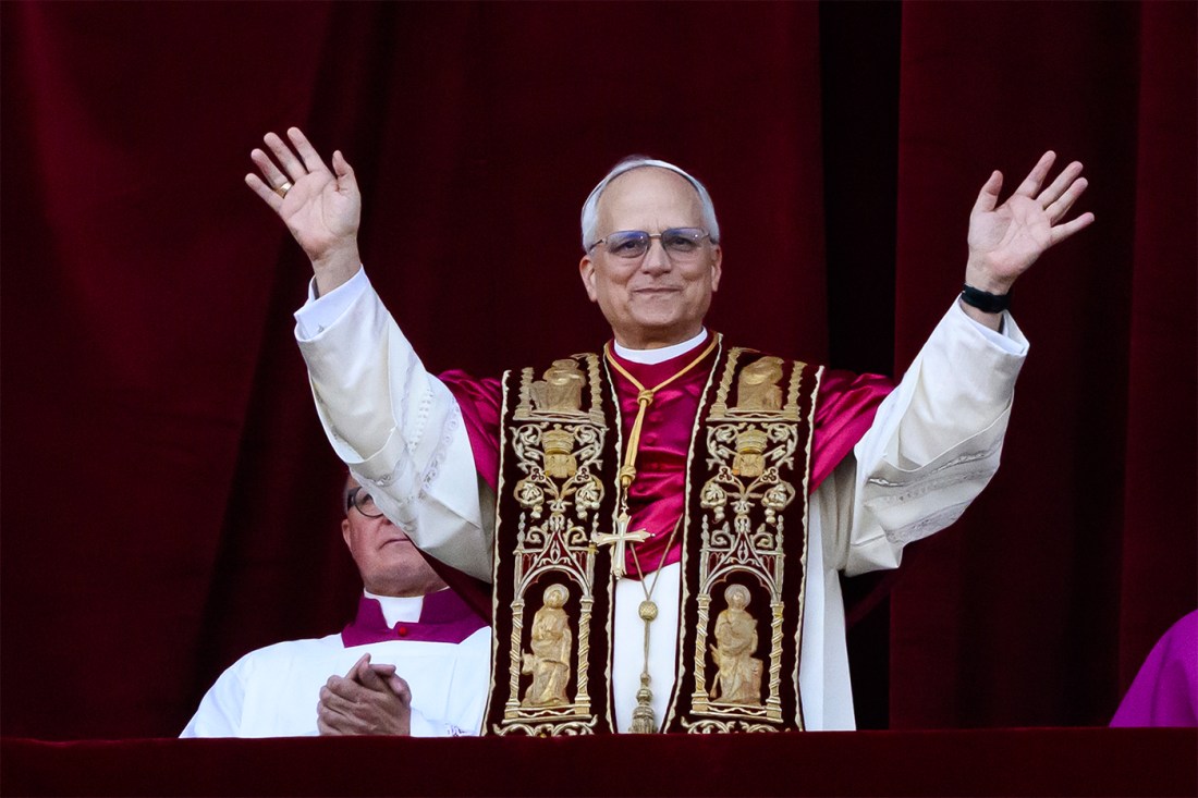 Pope Robert Francis Prevost Leo XIV greets the crowd from the balcony of St. Peter’s Basilica after his election in Vatican City.