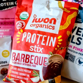 Bags of protein snacks laying out on a table.