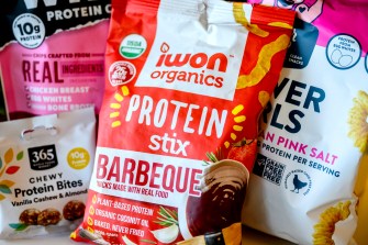 Bags of protein snacks laying out on a table.