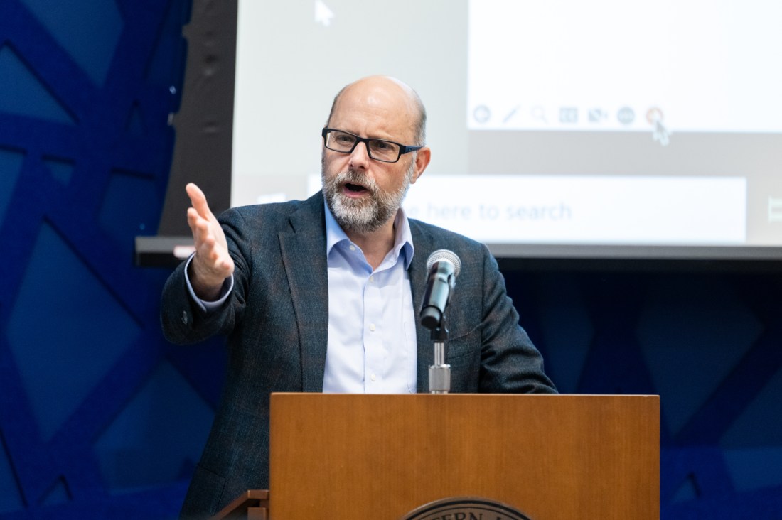 Panelist speaks at Northeastern discussion on the meaning of Juneteenth.