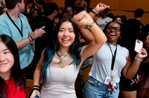 Three Northeastern students enjoying Oakland convocation.
